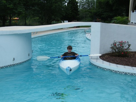 Mary Ellen's grandson, Russel, practicing his kayaking skills in the pool.