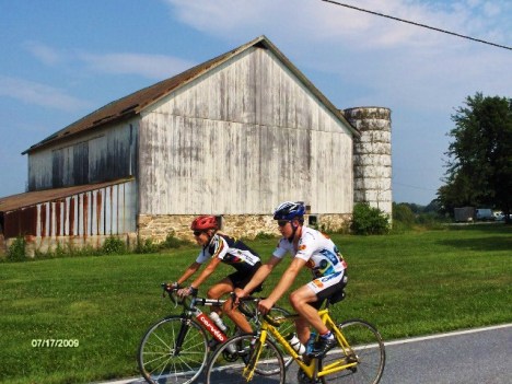 My nephew and future elite cyclist, Chad Ramsay, riding along a country road.  Love the barn!  This was one of many we passed during our training ride.  